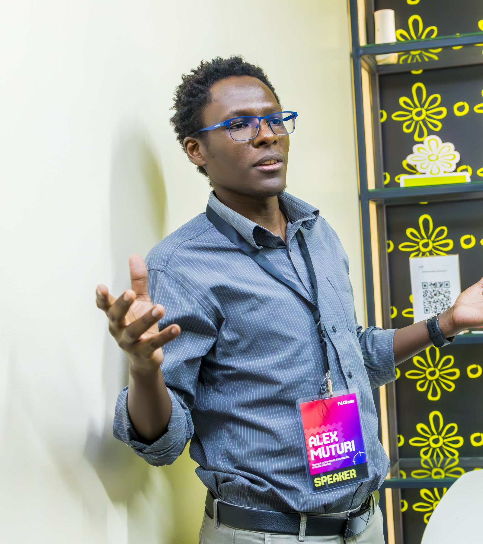 Alex Muturi speaking at a developer event.